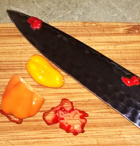Sliced Reaper, little Ghost Pepper, and half a Habanero